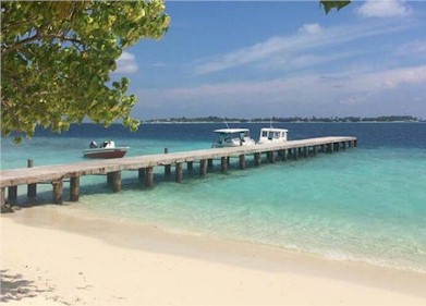 Arrival jetty photo of resort island